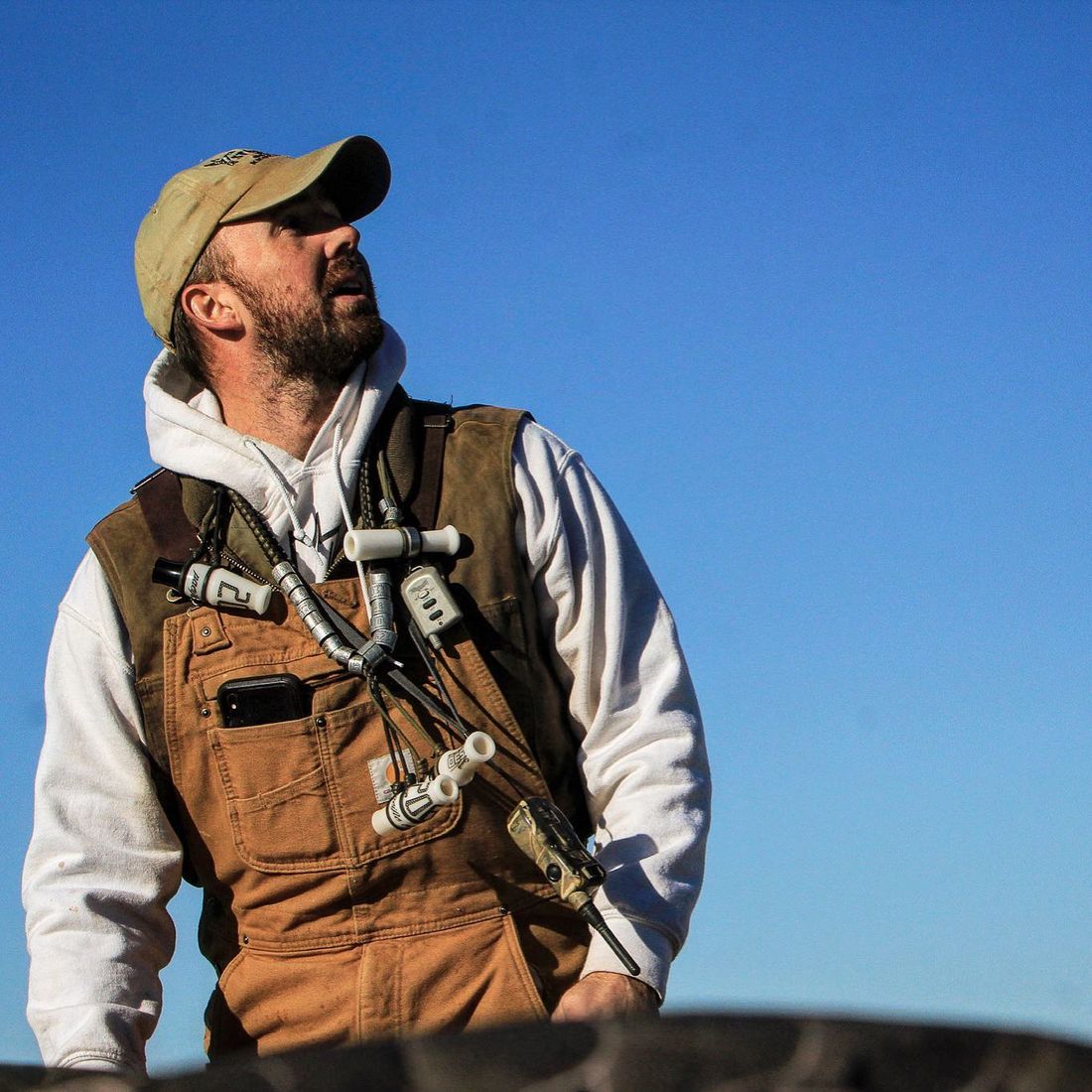 Hunter in cattails on a foggy Texas morning