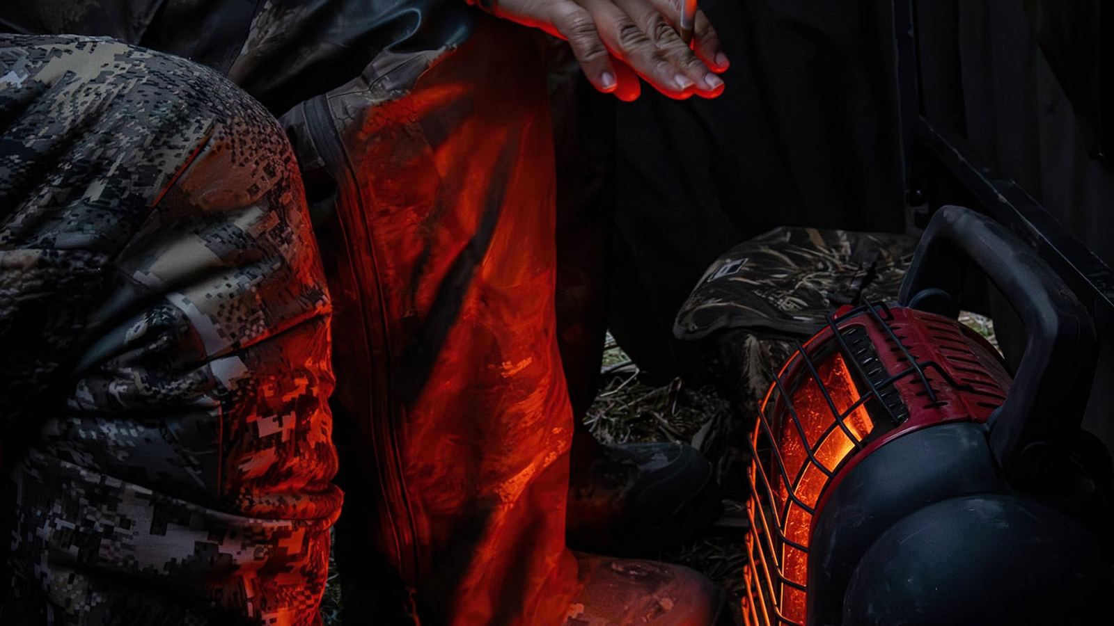 Hunters in the blind with a propane heater going
